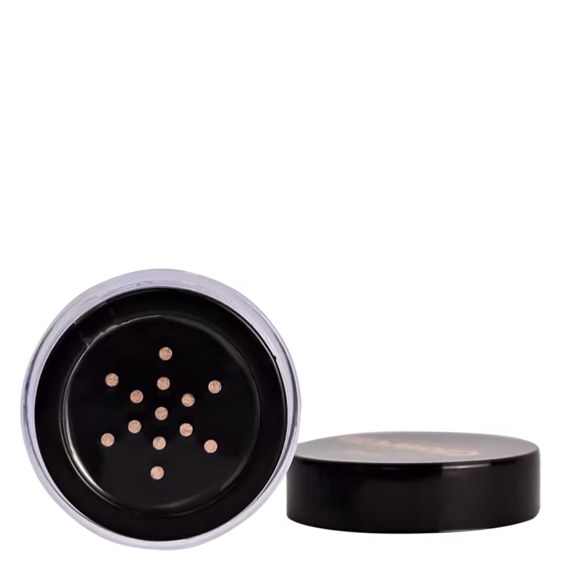 Embalagem preta com pequenos orifícios circulares, mostram o interior da embalagem.