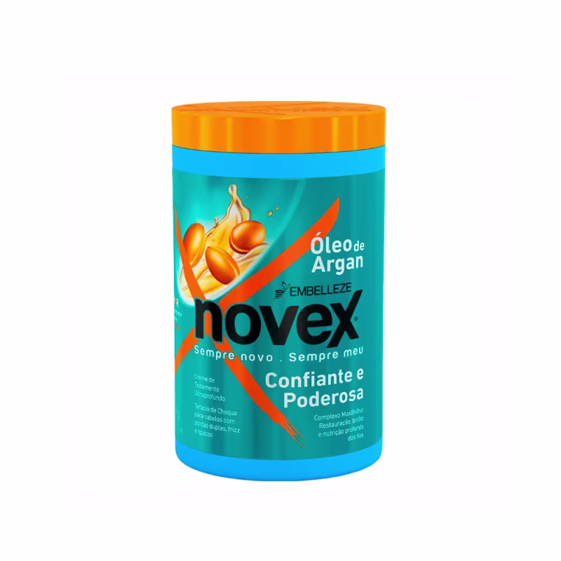 A imagem mostra o Creme de Tratamento Óleo de Argan 400g da marca Novex. É um pote plástico cilíndrico na cor azul com tampa laranja. O rótulo destaca que o produto oferece restauração, brilho e nutrição profunda.