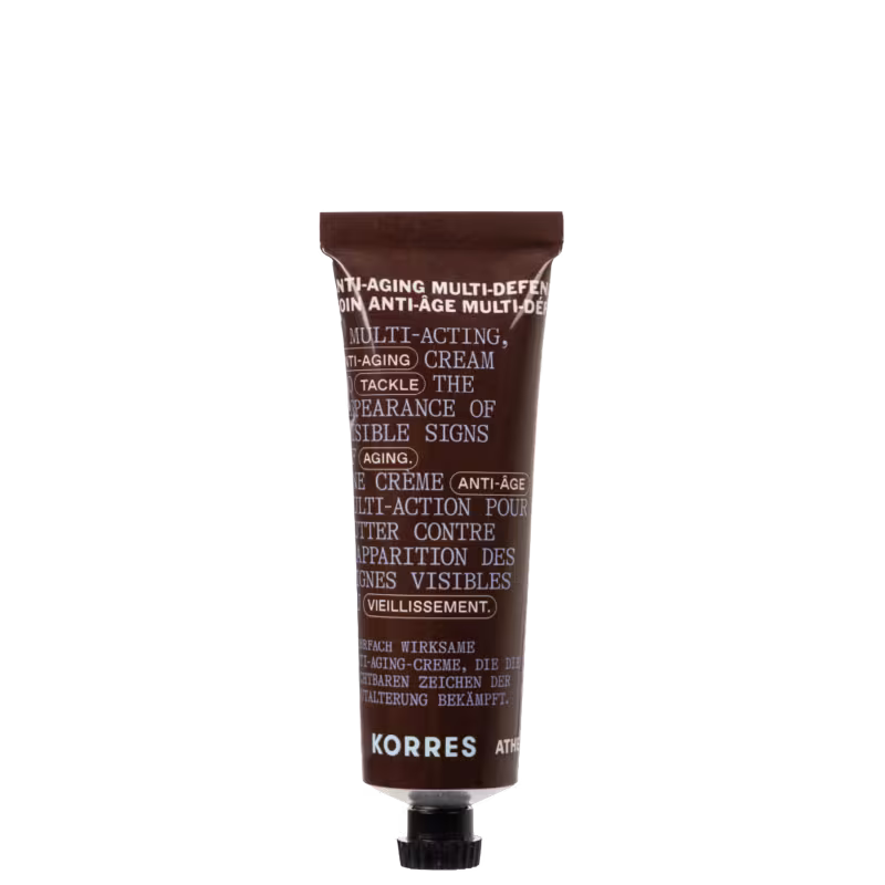 Tubo de creme anti-envelhecimento multi-ação da marca Korres, com rótulo marrom destacando seus benefícios e ingredientes. O produto promete combater os sinais visíveis do envelhecimento.