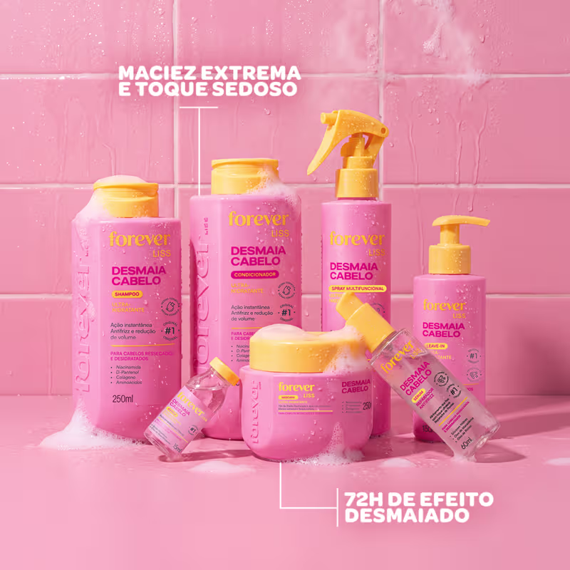 Produtos de beleza da linha Forever Liss, incluindo shampoo, condicionador, spray, sérum e leave-in, em embalagens rosa e amarelas com rótulos indicando os benefícios para cabelos ressecados e desidratados.