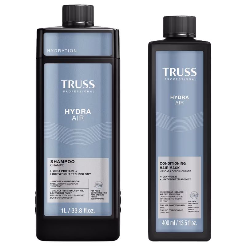 Dois produtos da linha Truss Professional: um frasco de shampoo Hydra Air e um frasco de máscara condicionadora Hydra Air, ambos em embalagens pretas e azuis com detalhes em texto branco.