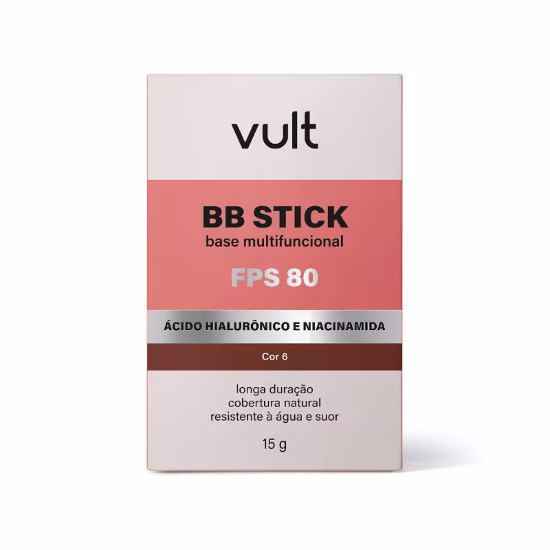 Caixa de BB Stick multifuncional da marca Vult, com FPS 80, contendo ácido hialurônico e niacinamida. Embalagem retangular com predominância das cores rosa e marrom, com informações sobre a composição e características do produto.