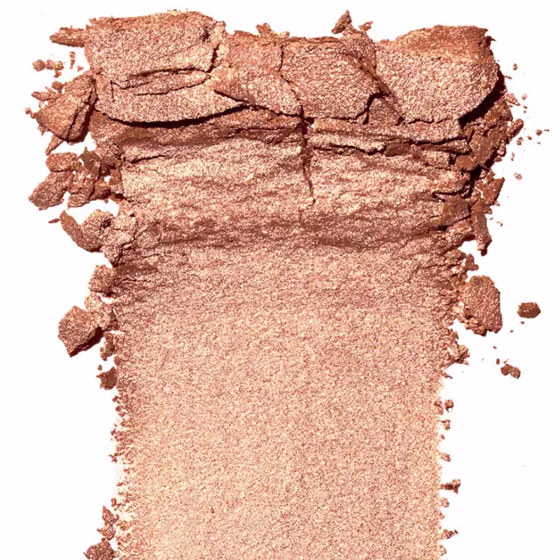 Textura do produto amassada e espalhada sobre uma superfície plana.