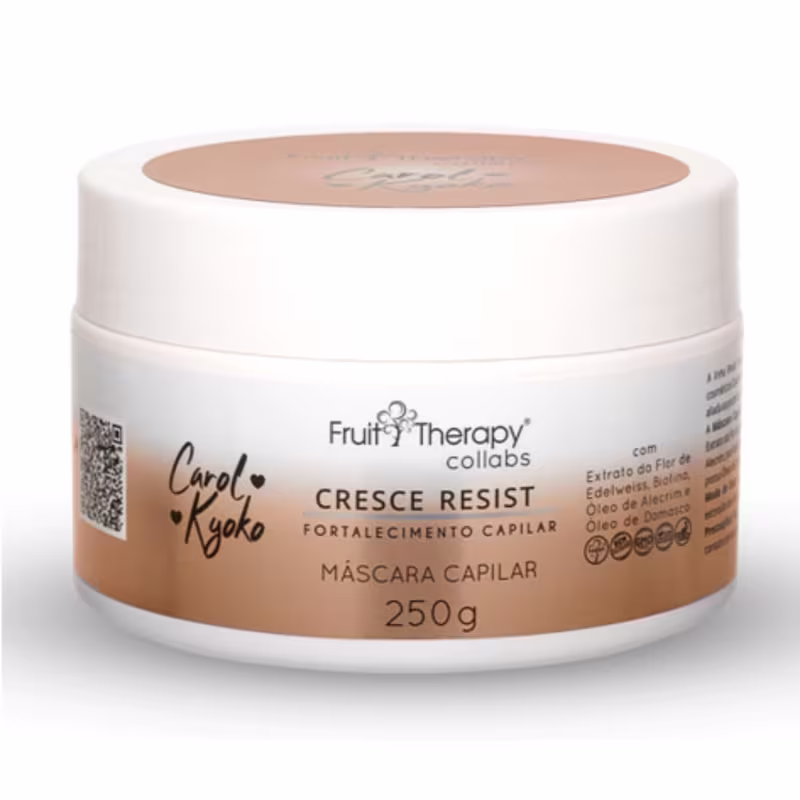 A imagem mostra um pote de plástico branco com tampa rosada que contém uma máscara capilar de 250g. É descrito que é uma máscara fortalecedora que contém extrato de flor de edelweiss, óleos de alecrim e damasco.