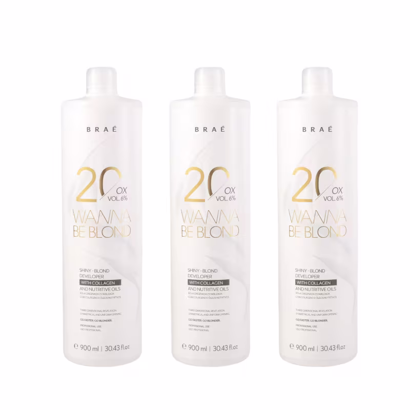 A imagem mostra três frascos brancos da água oxigenada Braé. Cada frasco possui um rótulo com o texto "20 Vol 6% Wanna Be Blond", com uma concentração de 20 volumes de peróxido de hidrogênio.