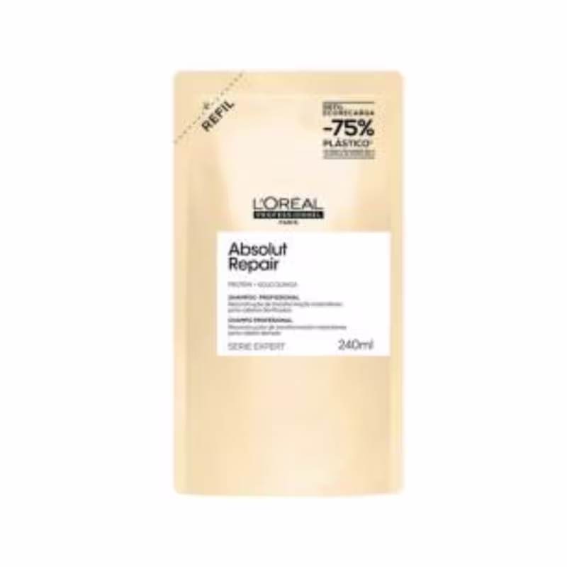 A imagem mostra o frasco do shampoo, é um refil retangular na cor amarelo claro.
