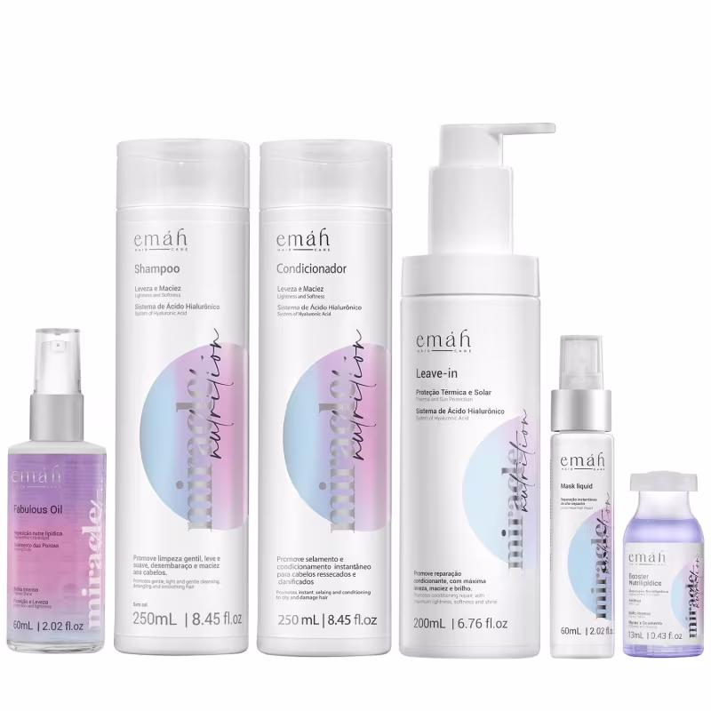 Conjunto de produtos de cuidados capilares da marca Emáh, incluindo shampoo, condicionador, leave-in, óleo e máscara em embalagens brancas e coloridas com detalhes em rosa e azul.