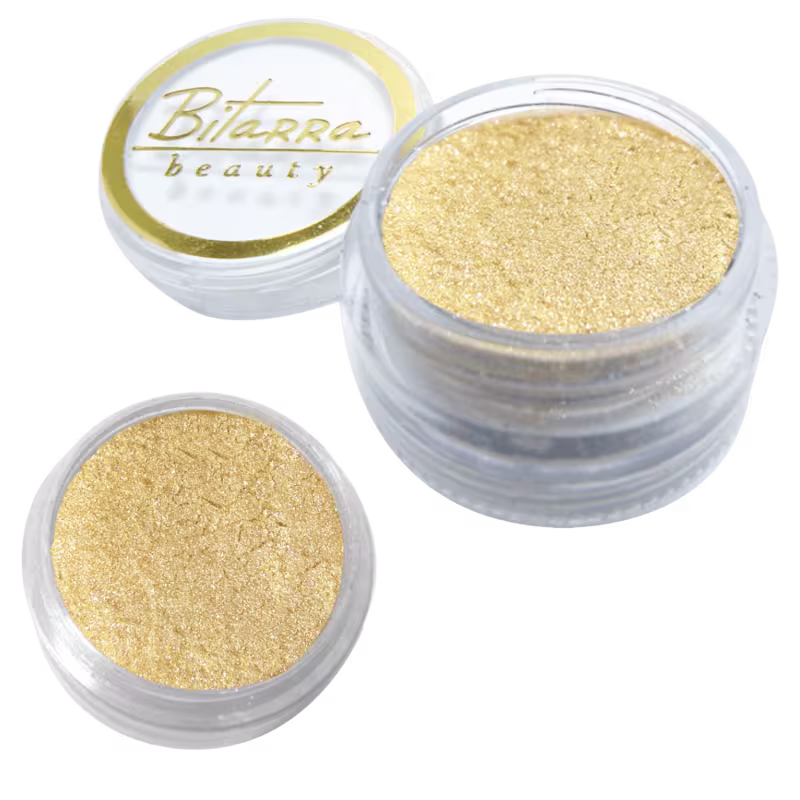 Potes de pó dourado brilhante da marca Bitarra Beauty, com rótulos em letras douradas. O produto é um pigmento em pó
