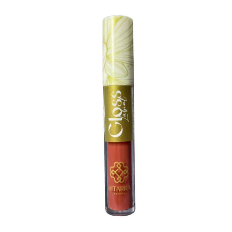 Tubo de gloss labial da marca Bitarra Beauty, com embalagem em tons de amarelo e laranja, apresentando um padrão floral.