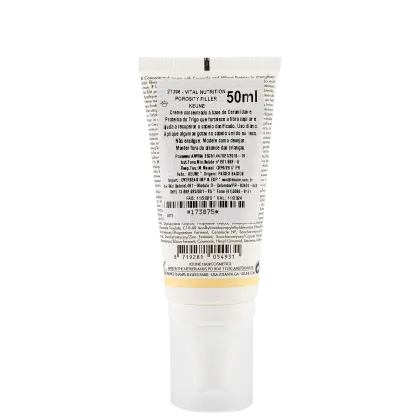 Frasco branco da linha Keune Care, contendo o produto Vital Nutrition Porosity Filler, um tratamento para cabelos secos e danificados. O rótulo apresenta o nome do produto e a marca Keune em destaque.
