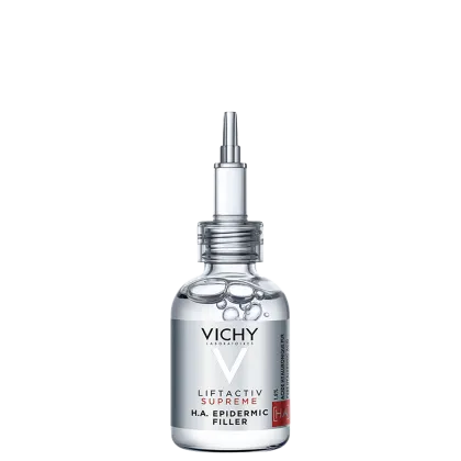 Frasco de vidro transparente com pipeta dosadora contendo o sérum Liftactiv Supreme da Vichy, com rótulo destacando o ingrediente H.A. Epidermic Filler. Embalagem em cores branca e prata, com o logotipo da marca Vichy.