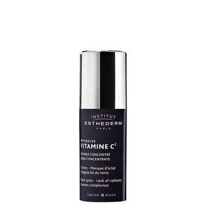 Frasco de tratamento intensivo de vitamina C2 da marca Esthederm. Embalagem preta e branca com texto destacando os benefícios do produto para manchas e falta de luminosidade da pele.