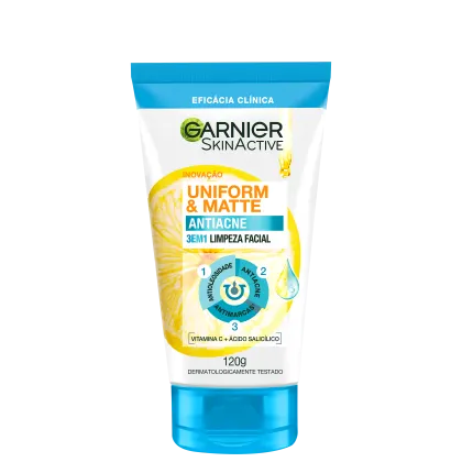 Tubo de limpeza facial Garnier SkinActive Uniform & Matte Antiácne 3em1, com 120g, apresentando embalagem branca e azul com detalhes amarelos e informações sobre os benefícios do produto.