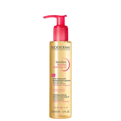 Frasco de óleo de limpeza micelar da marca Bioderma, com bomba doseadora vermelha, rótulo dourado e texto "Sensibio Micellar Cleansing Oil" em destaque.