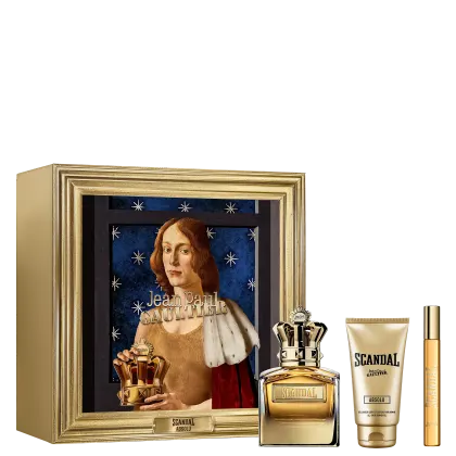 O produto apresentado é uma coleção de fragrâncias e itens de cuidados pessoais da marca Jean Paul Gaultier. Inclui um frasco de perfume dourado, uma loção corporal em embalagem dourada e um frasco de perfume menor.