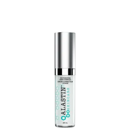 Sérum hidratante Alastin. Frasco cilíndrico de metal prateado com tampa preta. Rótulo na parte inferior com o nome do produto "Restorative Skin Complex" e a descrição "Serum Corrector Visage" (Sérum Corretor Facial) em letras pretas e azuis.