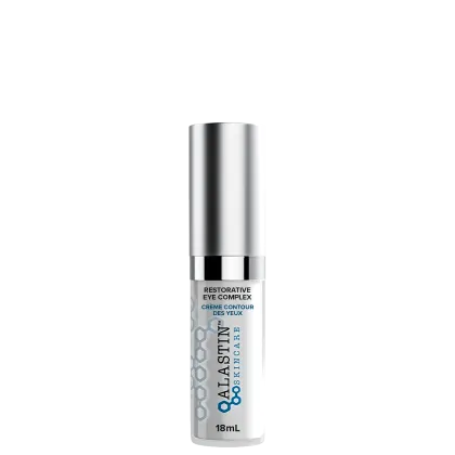 Sérum para a área dos olhos de Alastin. Embalagem cilíndrica de metal prateado. Rótulo na parte inferior com o texto "Restorative Eye Complex" e "Crème Contour des Yeux" em letras pretas sobre fundo branco.