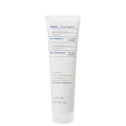 Tubo de creme de limpeza espumante da marca Korres, com rótulo em inglês e grego indicando ingredientes pré e probióticos. Embalagem branca com detalhes azuis, contendo 150 ml do produto.