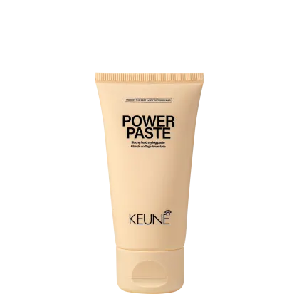 A imagem mostra  a Pasta Modeladora Power Paste da marca Keune, com embalagem tubular na cor bege e texto indicando que é uma pasta para modelar e dar fixação forte aos cabelos.