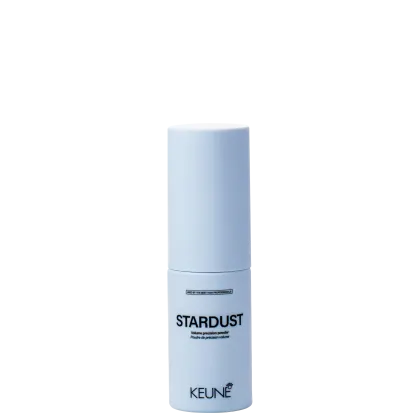 Produto de volume em pó da marca Keune. Embalagem cilíndrica branca com o nome "STARDUST Volume-enhancing powder" em preto.