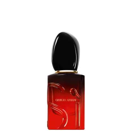 O frasco possui um formato retangular com uma tampa oval, com a marca "Giorgio Armani" impressa em destaque. A cor predominante é o vermelho escuro, com um acabamento brilhante.