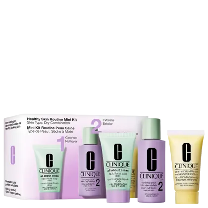 Caixa de kit de rotina de pele saudável para pele seca e mista. Contém limpador, esfoliante, loção clarificante e hidratante. Embalagem com frascos e tubos nas cores verde, lilás e amarelo com logotipo da marca Clinique.
