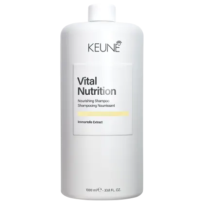 Frasco branco da linha Vital Nutrition da Keune, com rótulo em preto e amarelo, contendo shampoo nutritivo.