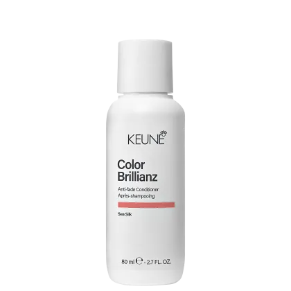 Frasco branco de 80 ml da linha Color Brillianz da Keune, um condicionador para cabelos coloridos, com rótulo preto e laranja destacando o nome do produto e a tecnologia "Sea Silk".