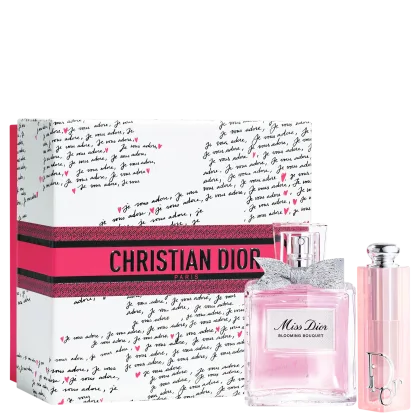 Caixa rosa com logotipo da Christian Dior Paris e frasco de perfume Miss Dior Blooming Bouquet e lip balm Dior Addict