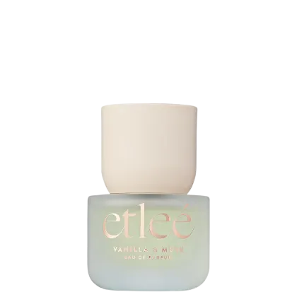 Frasco de perfume Etleé em tons de verde claro e branco. Rótulo com o nome da marca e a fragrância "Vanilla & Musk" em destaque e letras douradas