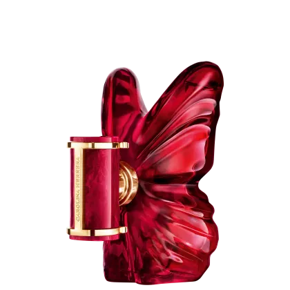 Frasco de perfume Carolina Herrera em formato de borboleta, com tampa dourada e corpo em tom vermelho intenso, destacando-se pela sua forma escultural e elegante.
