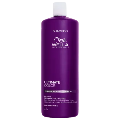 Frasco de shampoo da linha Ultimate Color da Wella Professionals, com 1 litro, em embalagem roxa com detalhes em branco, contendo informações sobre a fórmula com glicina e pró-vitamina B5.