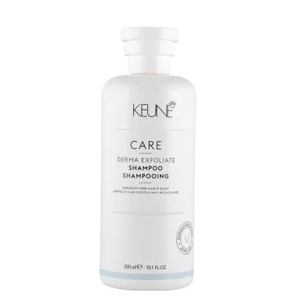 Frasco branco de shampoo Keune Care Derma Exfoliate, com rótulo em preto e branco indicando o nome do produto e sua função de remover caspa do couro cabeludo.