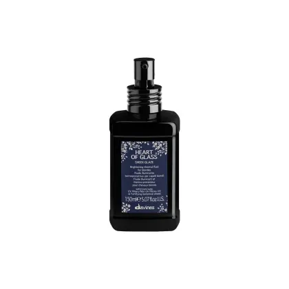 Frasco preto de 150ml da linha Heart of Glass da Davines, com rótulo azul e branco com flores, contendo fluido iluminador termo-protetor para cabelos.