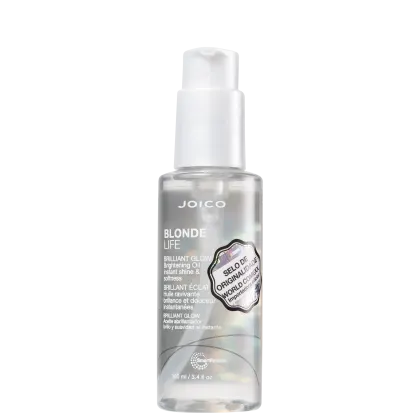 Frasco de óleo brilhante Joico Blonde Life, com embalagem branca e rótulo prateado, contendo 100 ml do produto. O rótulo destaca o "Brilho Instantâneo e Maciez" proporcionado pelo óleo.