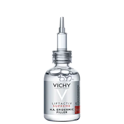 Frasco de vidro transparente com pipeta dosadora contendo o produto Liftactiv Supreme H.A. Epidermic Filler da Vichy. O rótulo apresenta o nome da marca e do produto em letras brancas sobre fundo preto.