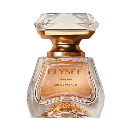 Eau de Parfum Elysée do Boticário em frasco de vidro transparente com detalhes geométricos facetados, como uma joia. O frasco tem uma base e tampa douradas metálicas. O líquido dentro é de cor âmbar claro.
