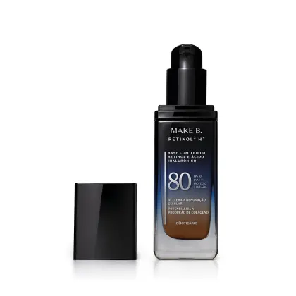 Imagem de vidro retangular aberto em degradê de preto para o azul base líquida da marca Make B.  Retinol 3 H+, na parte inferior se vê o tom marrom da base. O rótulo contém texto escrito em branco, com destaque para o FPS 80. Tampa preta ao lado do frasco