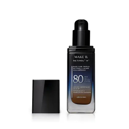 Frasco de vidro retangular aberto em degradê de preto para o azul base líquida da marca Make B.  Retinol 3 H+, na parte inferior se vê o tom marrom da base. O rótulo contém texto escrito em branco, com destaque para o FPS 80. Tampa preta ao lado do frasco
