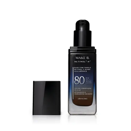 Frasco de vidro retangular aberto em degradê de preto para o azul base líquida da marca Make B.  Retinol 3 H+, na parte inferior se vê o tom marrom da base. O rótulo contém texto escrito em branco, com destaque para o FPS 80. Tampa preta ao lado do frasco