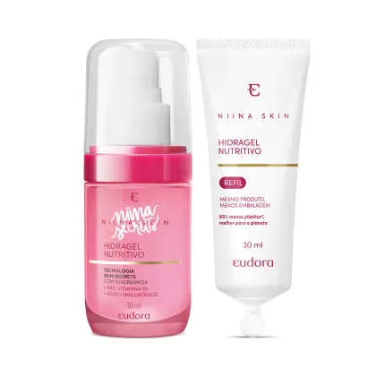 A imagem mostra um kit com um produto e um refil. Na esquerda, frasco plástico, pequeno, redondo, transparente de cor rosa, com líquido também rosa e tampa transparente branca. Na direita, uma bisnaga pequena de refil de gel hidratante.