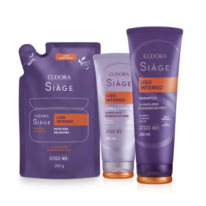 A imagem mostra um kit com três produtos, um refil de máscara capilar, uma bisnaga de condicionador e outra de shampoo. Todos com embalagem roxa, letras brancas e roxas.