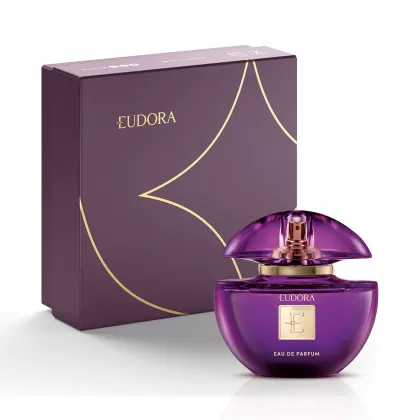 Frasco de perfume Eudora em embalagem roxa e dourada, com design elegante e sofisticado. O produto é apresentado em uma caixa de papelão também na cor roxa, com detalhes dourados.