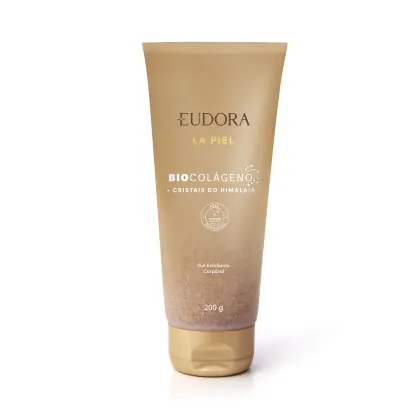 Tubo de gel esfoliante corporal da marca Eudora, da linha La Piel, com ingredientes de biocolageno e cristais do Himalaia, em embalagem bege e dourada.