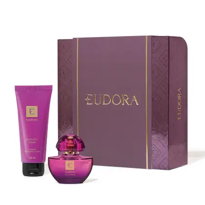 A imagem mostra Kit Eudora Roxo com Eau de Parfum 35ml +  Hidratante Desodorante Corporal 100ml. Traz ainda uma caixa presenteável
