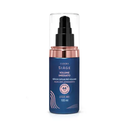 Frasco de soro capilar pro-volume da linha Siàge, com embalagem em tons de azul e rosa, contendo 100 ml do produto. O rótulo destaca o "Volume Imediato" e a ação anti-afrouxamento dos fios.