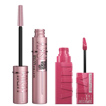 A imagem mostra produtos de maquiagem da Maybelline: uma máscara de gelo em embalagem rosa metálica e um batom líquido matte rosado. Todos os itens têm tonalidades rosadas e metálicas, focados em maquiagem para lábios e cílios.