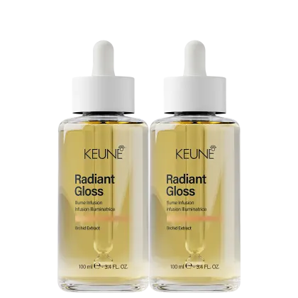 Dois frascos de vidro transparente contendo um líquido dourado, com rótulos brancos exibindo o nome da marca "Keune" e o nome do produto "Radiant Gloss". Cada frasco possui um conta-gotas branco no topo.