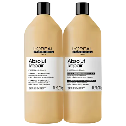 Dois frascos de shampoo e condicionador da linha Absolut Repair da L'Oréal Professionnel, com embalagens em tons de bege e preto, contendo informações sobre os produtos na frente.