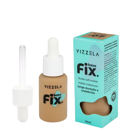 O produto é um base fix da marca Vizzela Cosméticos, em embalagem de frasco conta-gotas e caixa na cor turquesa. O produto é descrito como uma base fluida de cobertura média, com acabamento matte e longa duração.